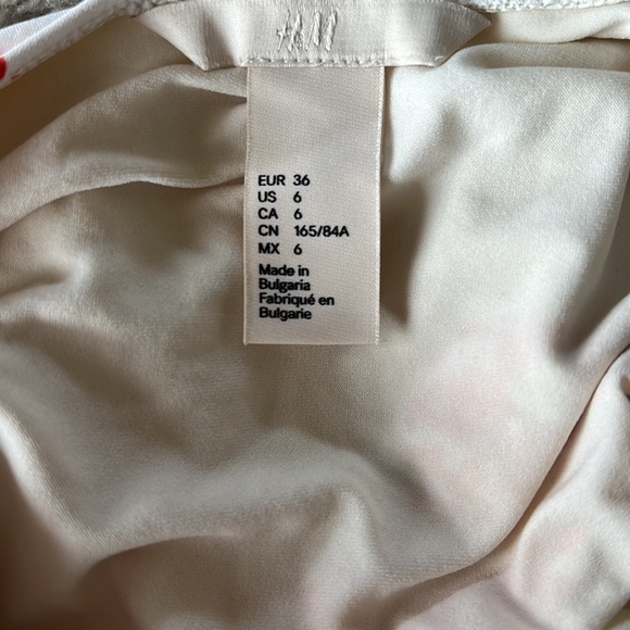 Red and white patterned one piece swimsuit from H&M, size 6. Moderate coverage. - Picture 3 of 3